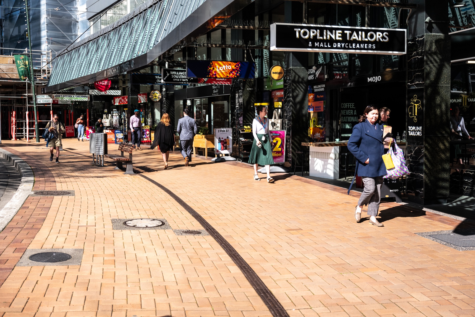 Pedestrians and shoppers walk along Lambton Quay in Wellington, New Zealand, on Dec. 15, 2020.&nbsp;