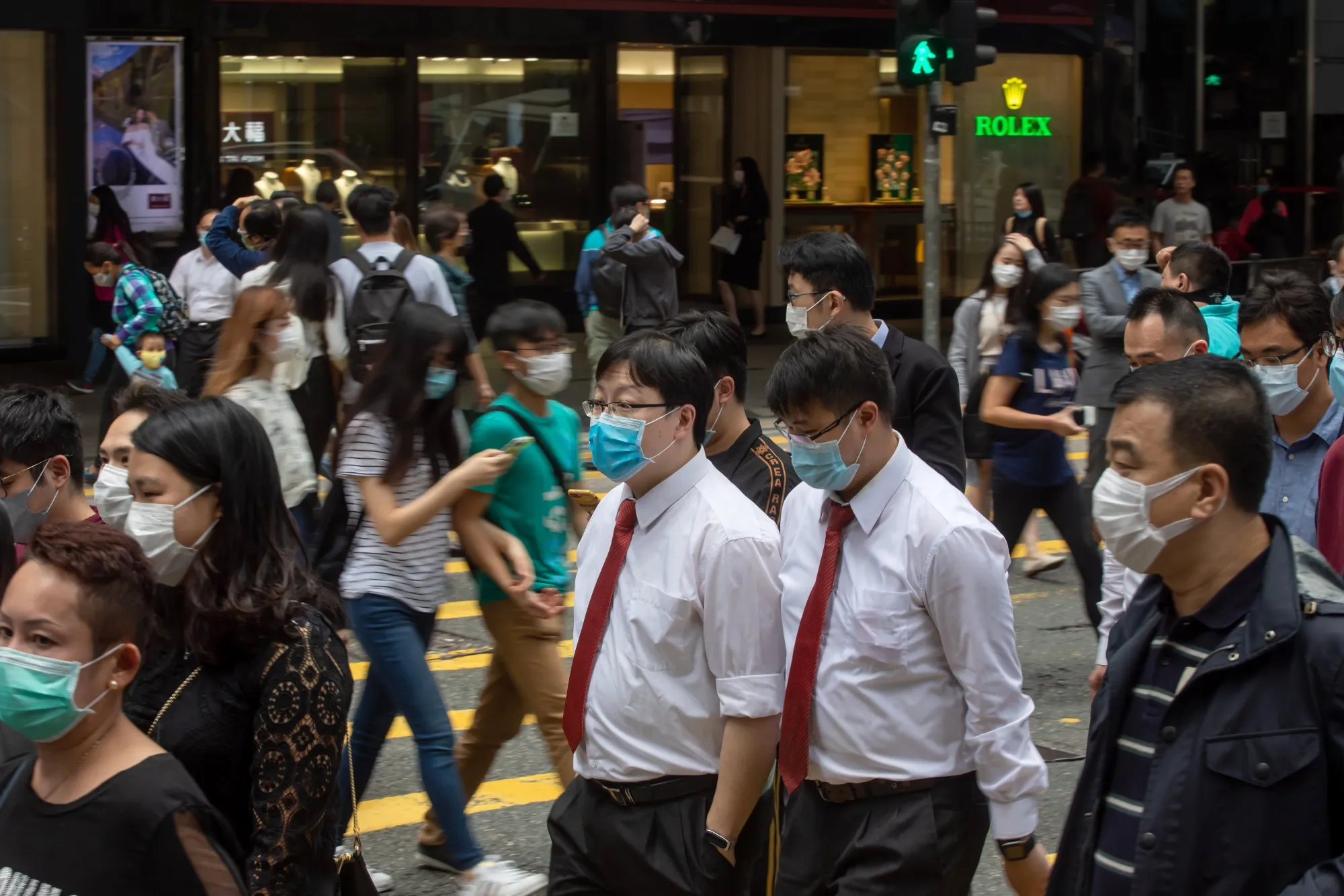 Officers Workers In Hong Kong's Central Business District As Stocks Priced Near All-Time Low
