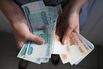 Russian Currency Exchanges As Ruble Falls To Record Low