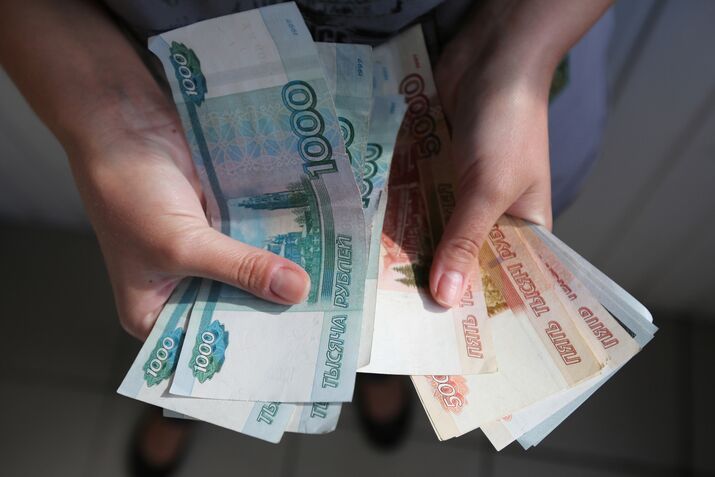 Russian Currency Exchanges As Ruble Falls To Record Low