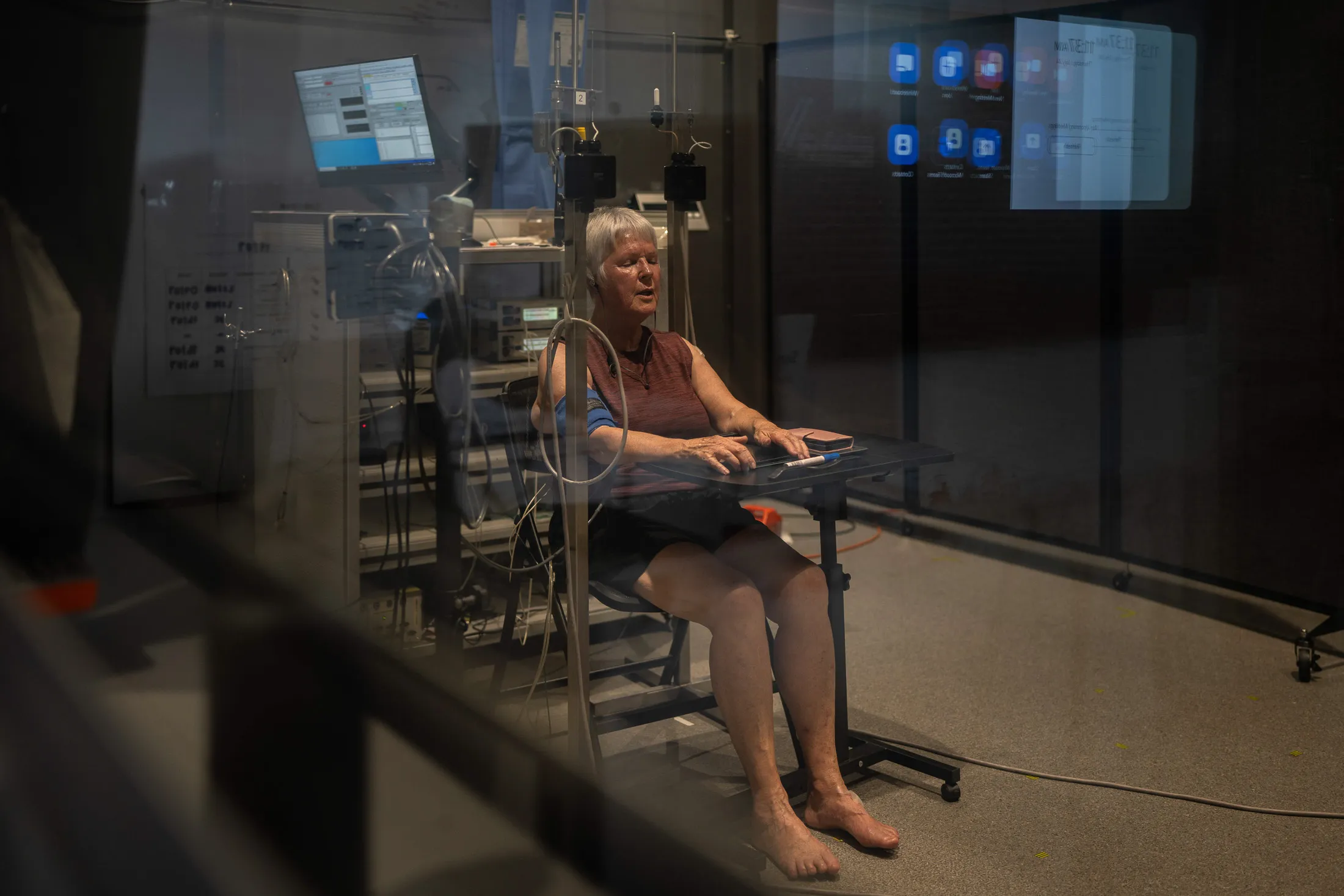 A participant during a heat stress trial inside a climate chamber at the University of Sydney.