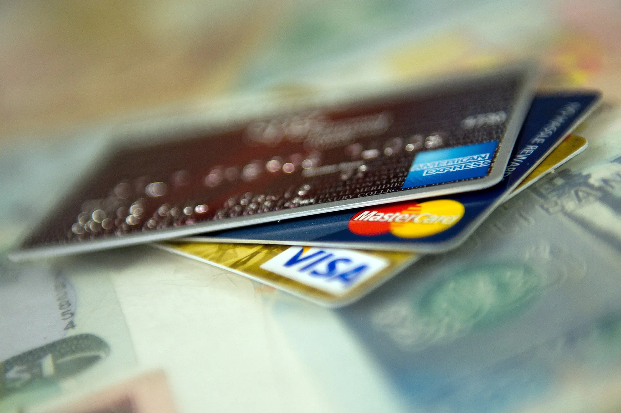 Consumers Use Credit Cards To Buy Necessities As Inflation Crimps Income