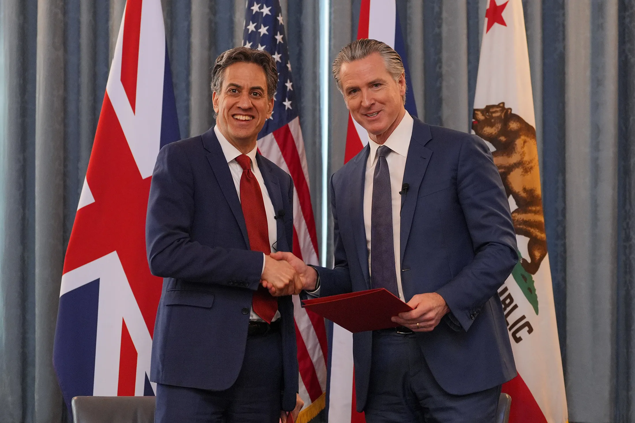 UK Energy Secretary&nbsp;Ed Miliband, left, and California Governor Gavin Newsom during a signing ceremony for a clean energy agreement in London on Feb. 16.