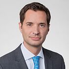 Headshot of John M Holmes