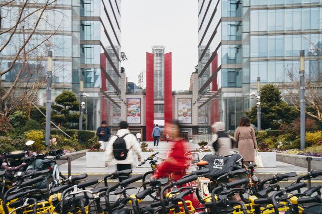 The morning rush to PDD headquarters in Shanghai.