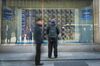 A pedestrian looks at an electronic stock board outside a securities firm in Tokyo, Japan, on Tuesday, Feb. 6, 2018. Japan’s blue-chip Nikkei 225 Stock Average entered a correction as the nation’s shares posted the biggest decline since November 2016, following U.S. peers lower amid rising concern that inflation will force interest rates higher.