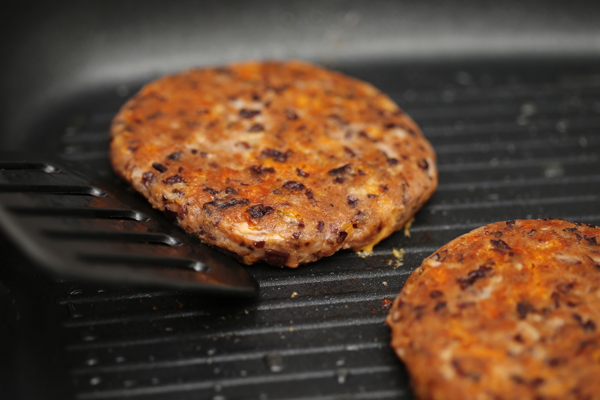 A vegetarian burger made with a canola protein powder.