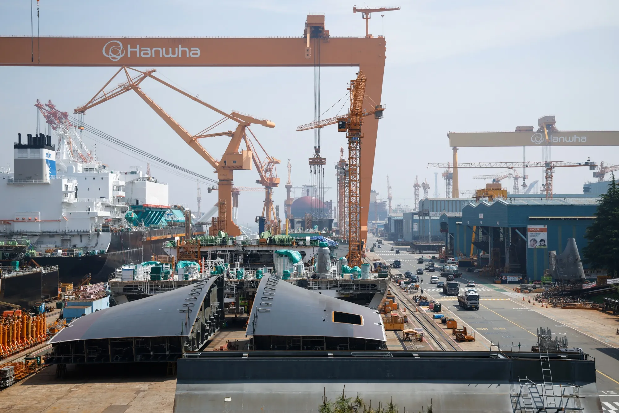 A modern shipyard, like this one in South Korea, showcases the advanced industrial capacity that could be leveraged to revitalize U.S. shipbuilding. (bwbx.io)