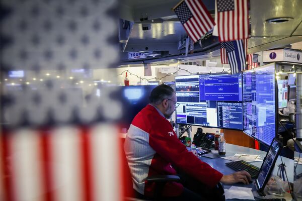 A trader works on the floor of the New York Stock Exchange