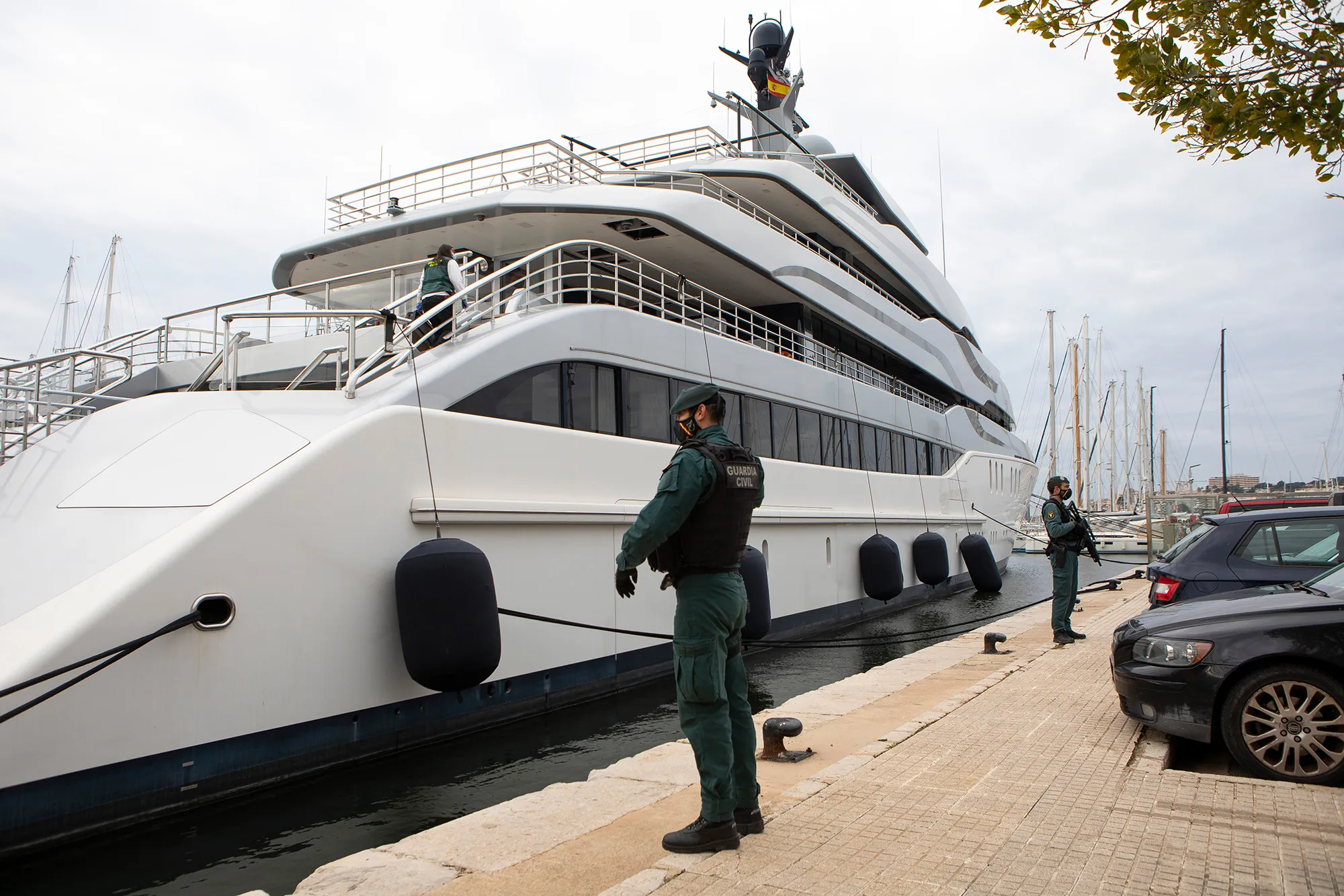Guardia Civil officers next to the Tango superyacht in Palma de Mallorca, Spain, on April 4.
