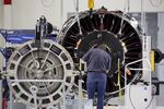 An employee assembles a jet engine at a GE plant&nbsp;in&nbsp;Lafayette, Indiana.
