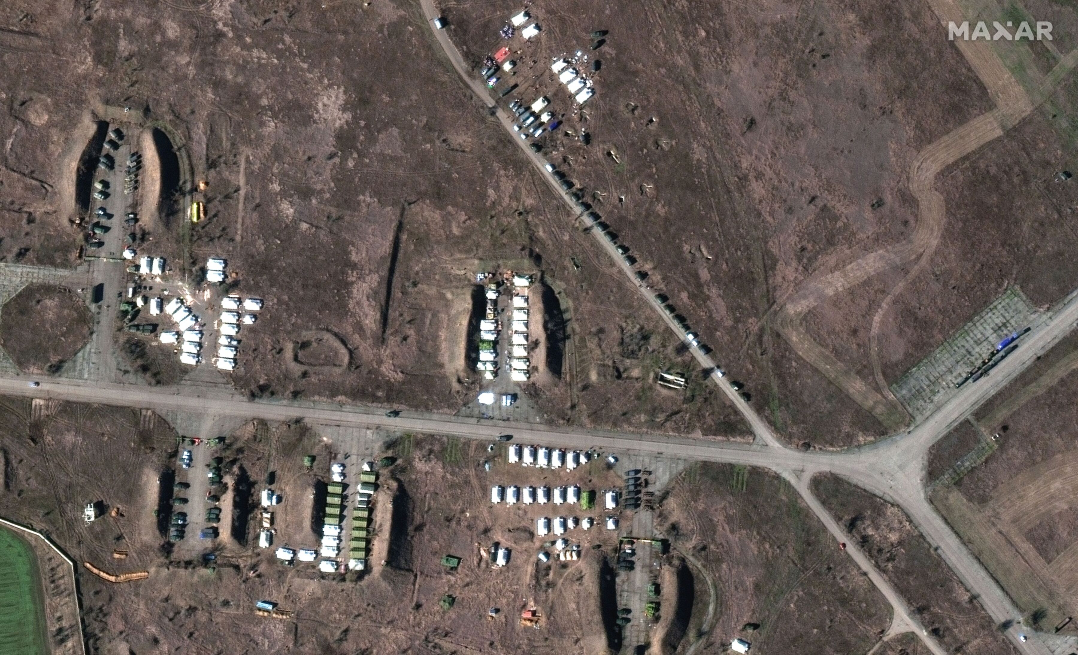 Maxar Technologies captured satellite imagery of troops, tents and equipment at the Oktyabrskoye in Crimea, on Feb. 10.