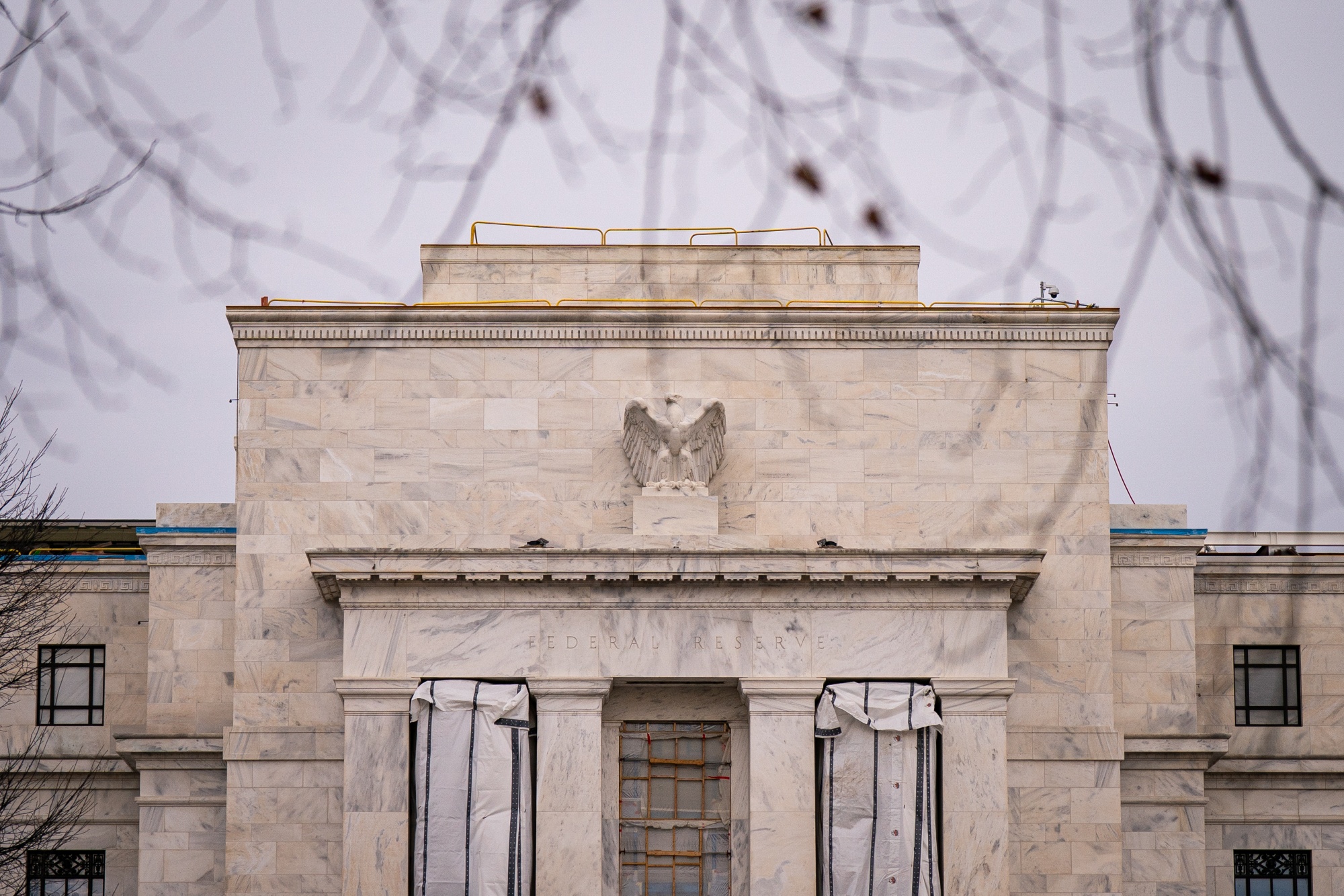 The Marriner S. Eccles Federal Reserve building in Washington, DC, US, on Monday, Dec. 15, 2025. Treasuries posted small gains as investors looked to a swath of delayed US economic reports ahead this week that have the potential to alter expectations for further Federal Reserve interest-rates cuts next year. Photographer: Al Drago/Bloomberg