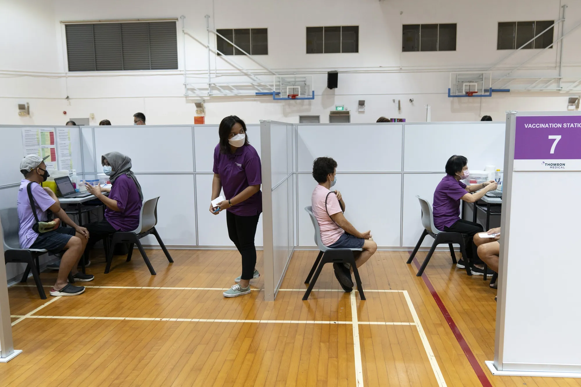 Singapore to Assess Reopening as Virus Cases, Vaccinations Rise - Bloomberg