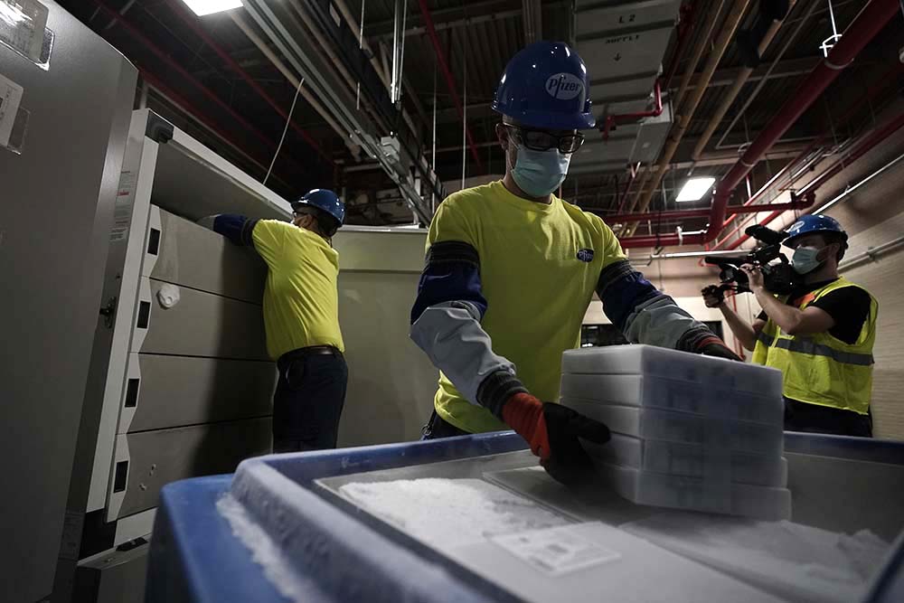 Pfizer-BioNTech vaccines prepared for shipment to the Pfizer Global Supply Kalamazoo manufacturing facility in Kalamazoo.