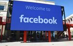 A giant digital sign is seen at Facebook's corporate headquarters campus in Menlo Park, California, on October 23, 2019.