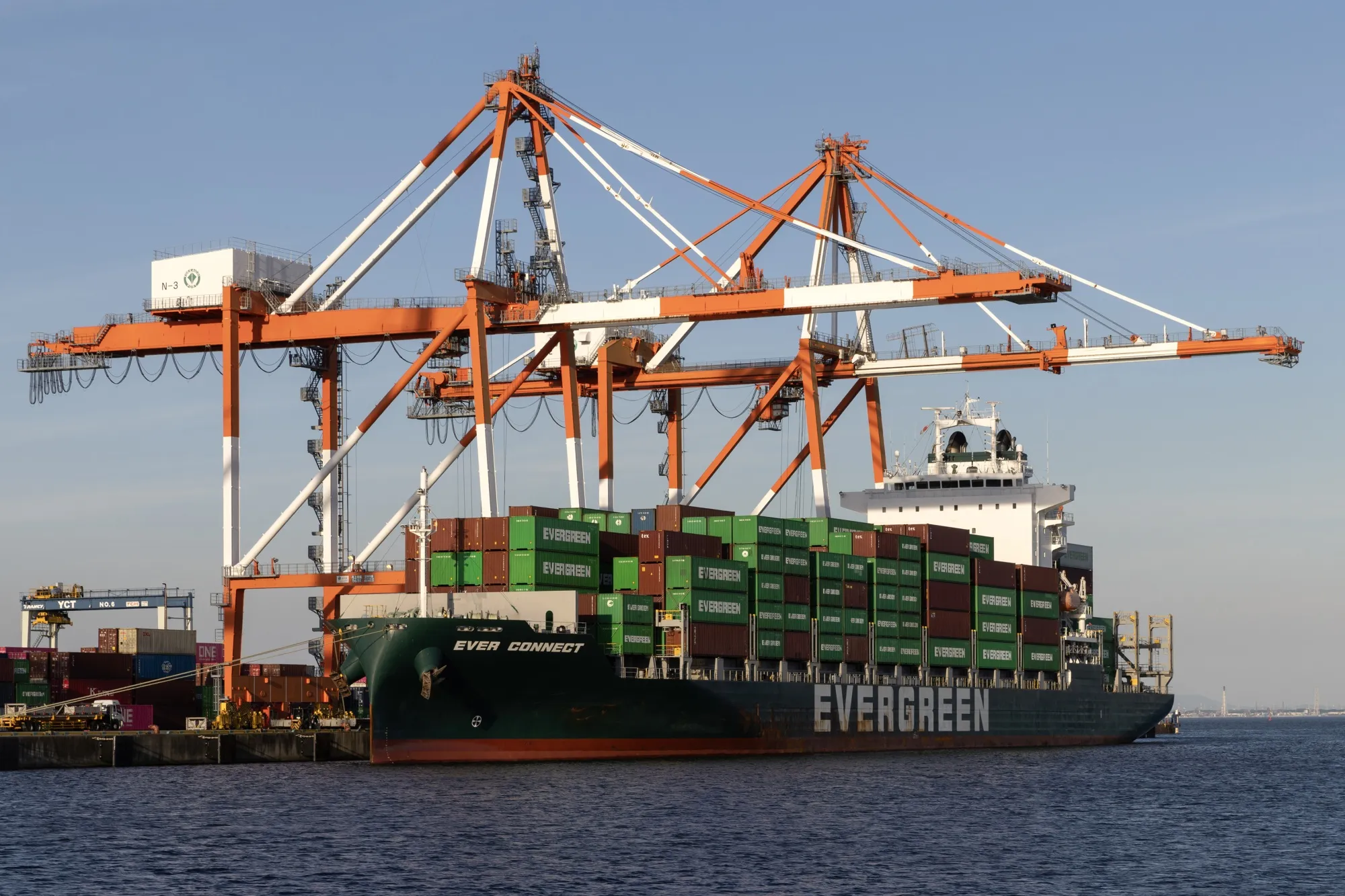 Container ship Ever Act on the dockside at the Yokkaichi Port in Yokkaichi, Japan.