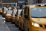 Taxis wait to pick up commuters in New York.