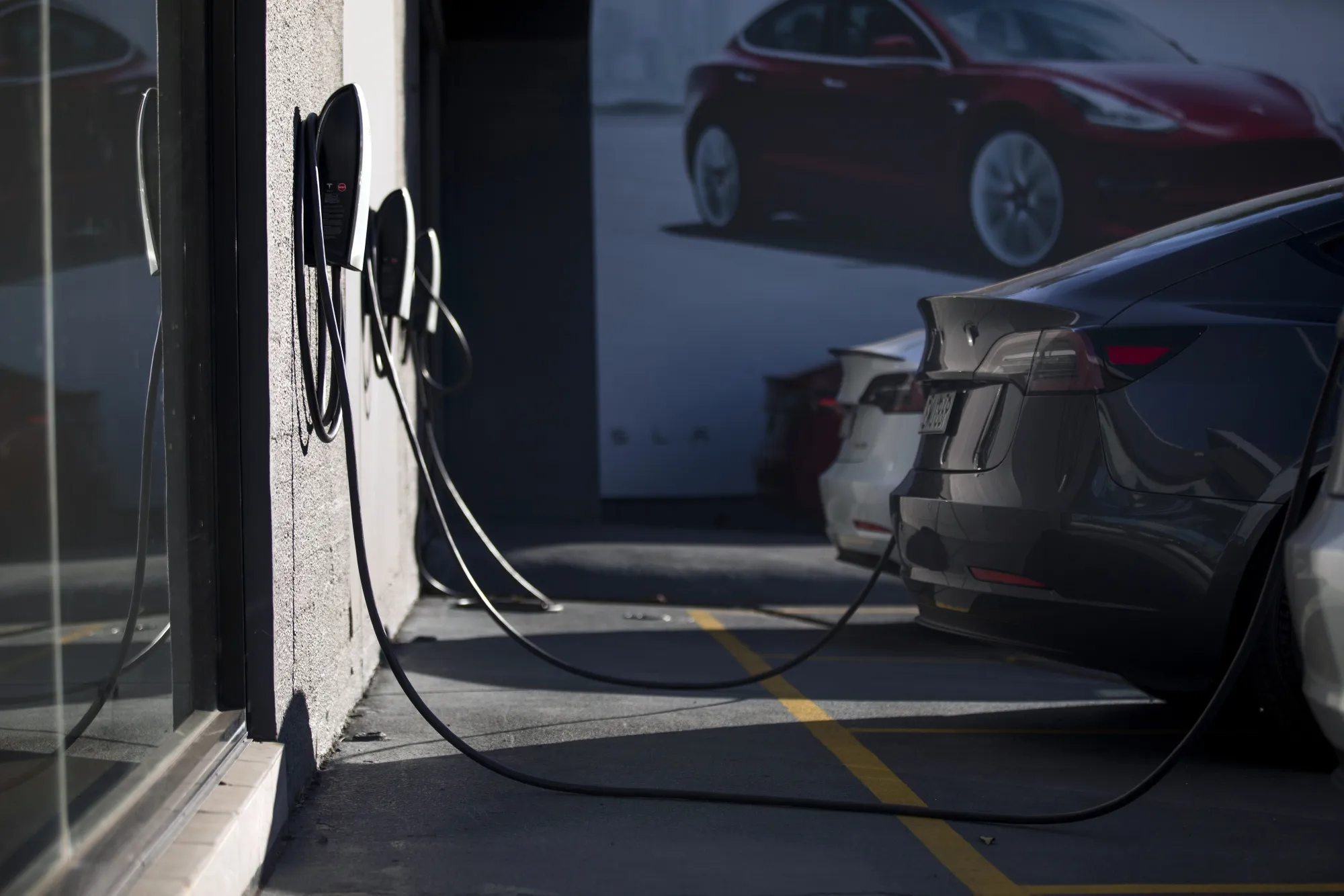 Tesla Inc. wall chargers at one of the automaker's temporary test drive centers in Sydney, Australia.