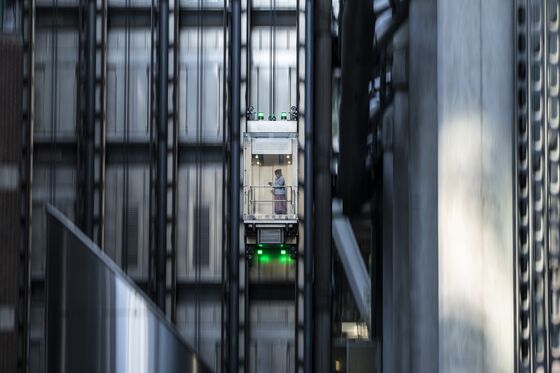 Workers Return to Weirder Offices With Moveable Walls and Touchless Elevators
