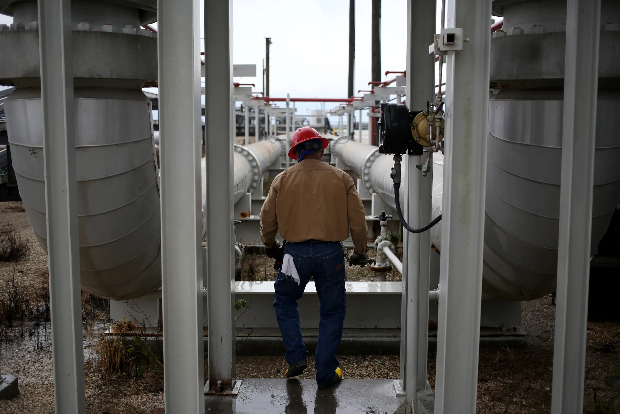 A contractor works on crude oil pipelines at the US&nbsp;Department of Energy's Bryan Mound Strategic Petroleum Reserve in Freeport, Texas.
