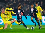 Paris Saint-Germain's&nbsp;Neymar, center, and&nbsp;Kylian Mbappe, second right,&nbsp; during a French L1 match in Dec.
