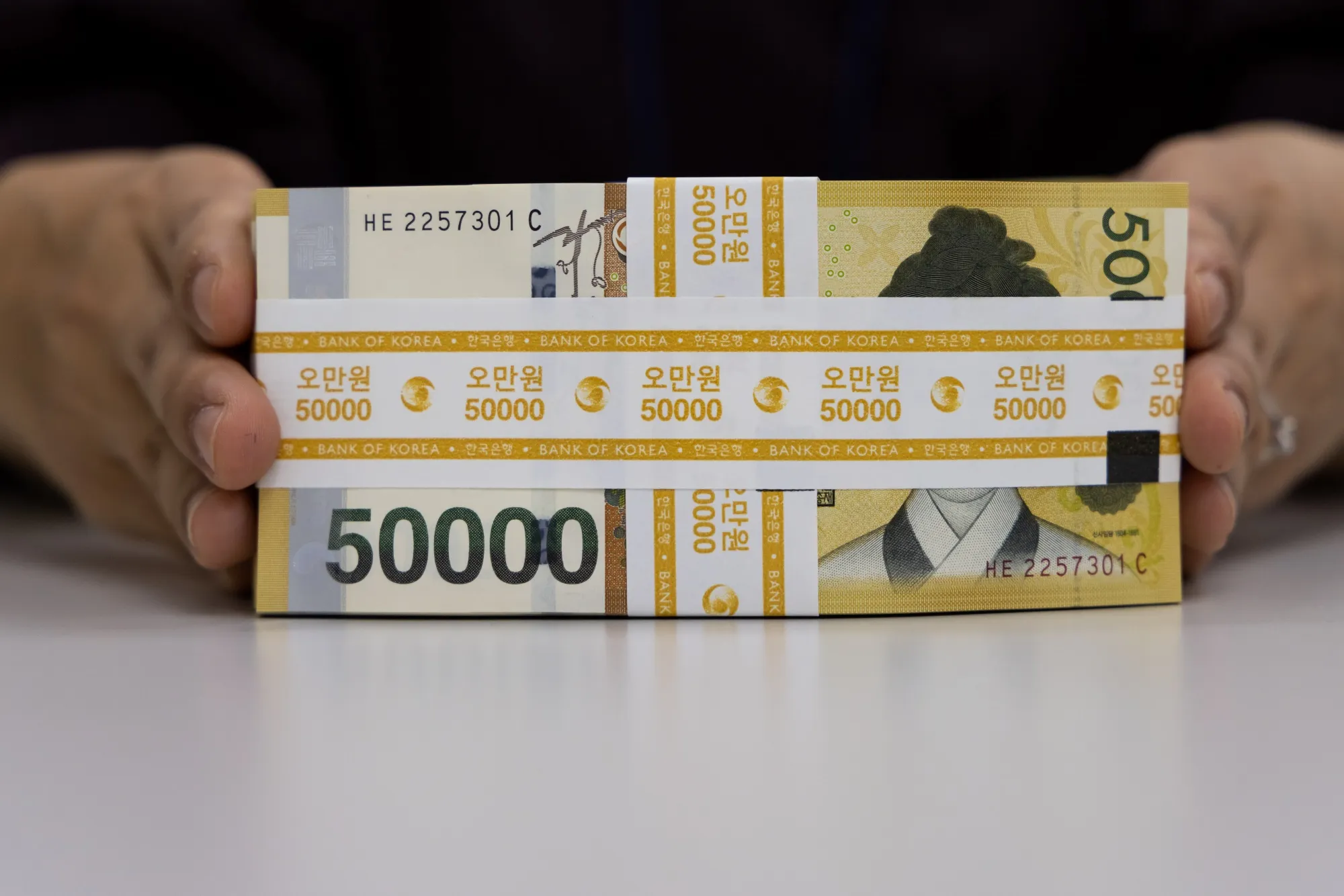 Bundles of 50,000 won banknotes.