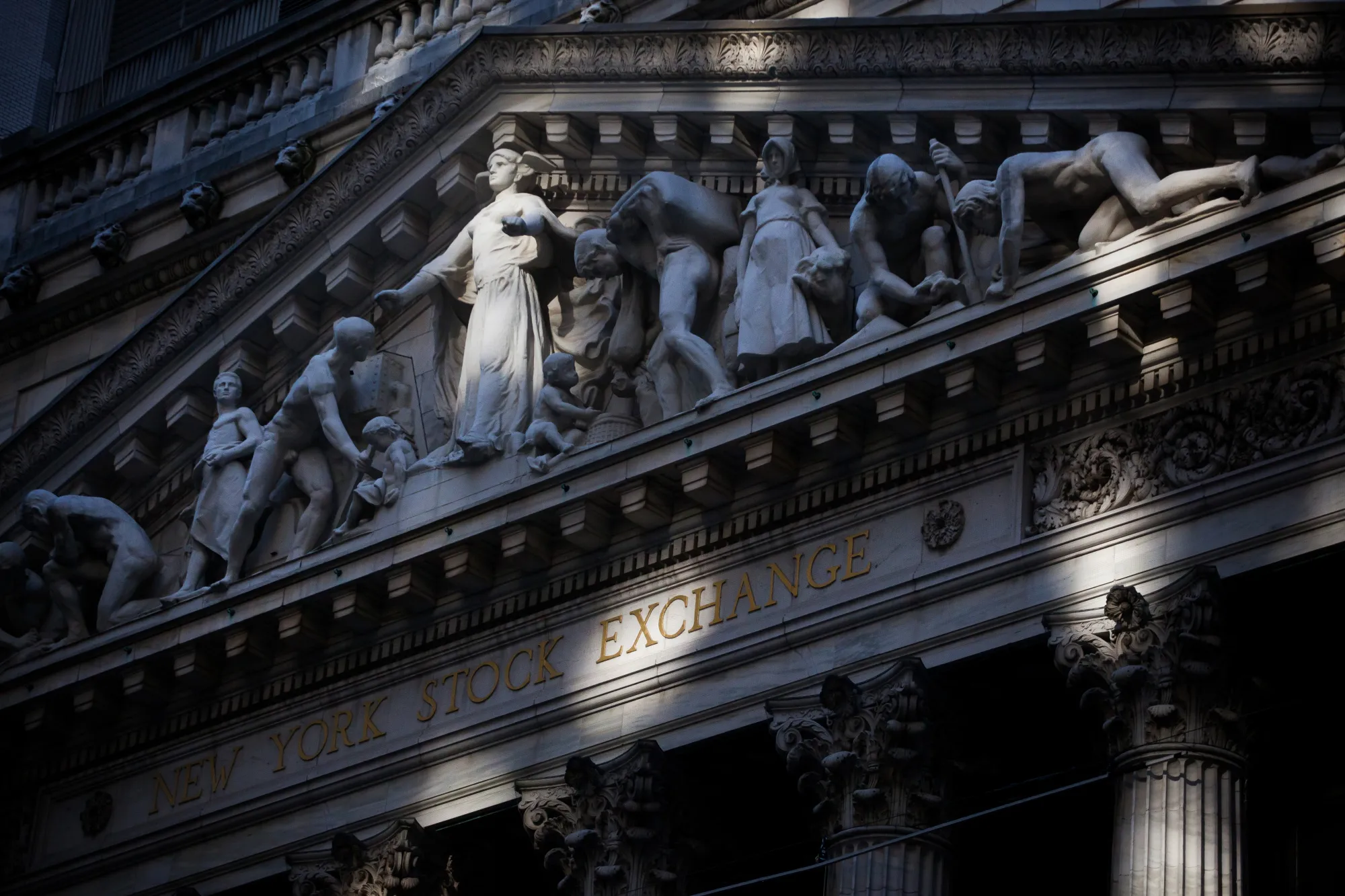 The New York Stock Exchange (NYSE) stands in New York, U.S., on Monday, Dec. 11, 2017. U.S. stocks were higher after an explosion rocked midtown Manhattan. The dollar fell and Treasuries rose.