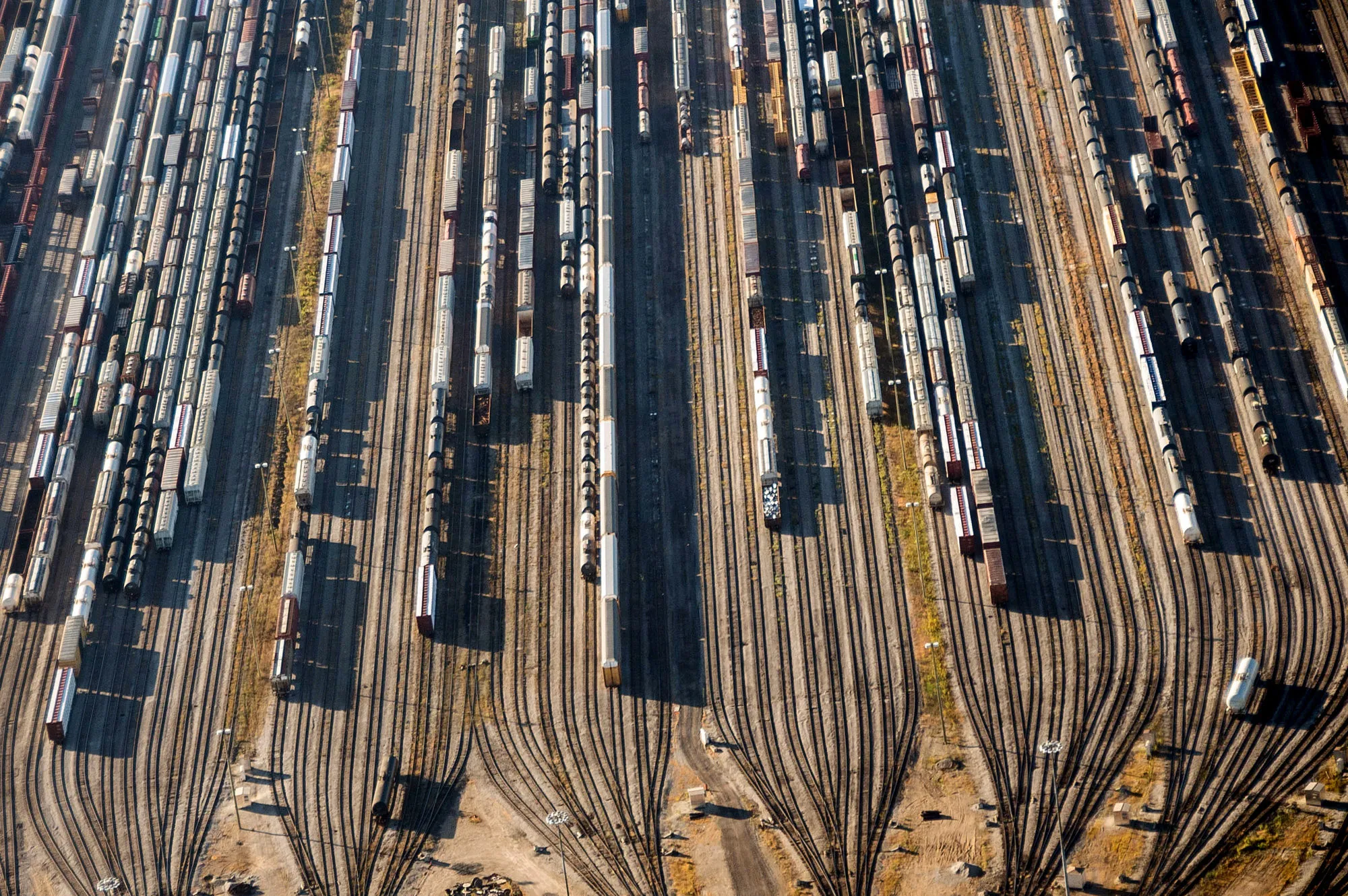 Freight trains and oil tankers sit in a rail yard in this aerial photograph taken above Toronto.