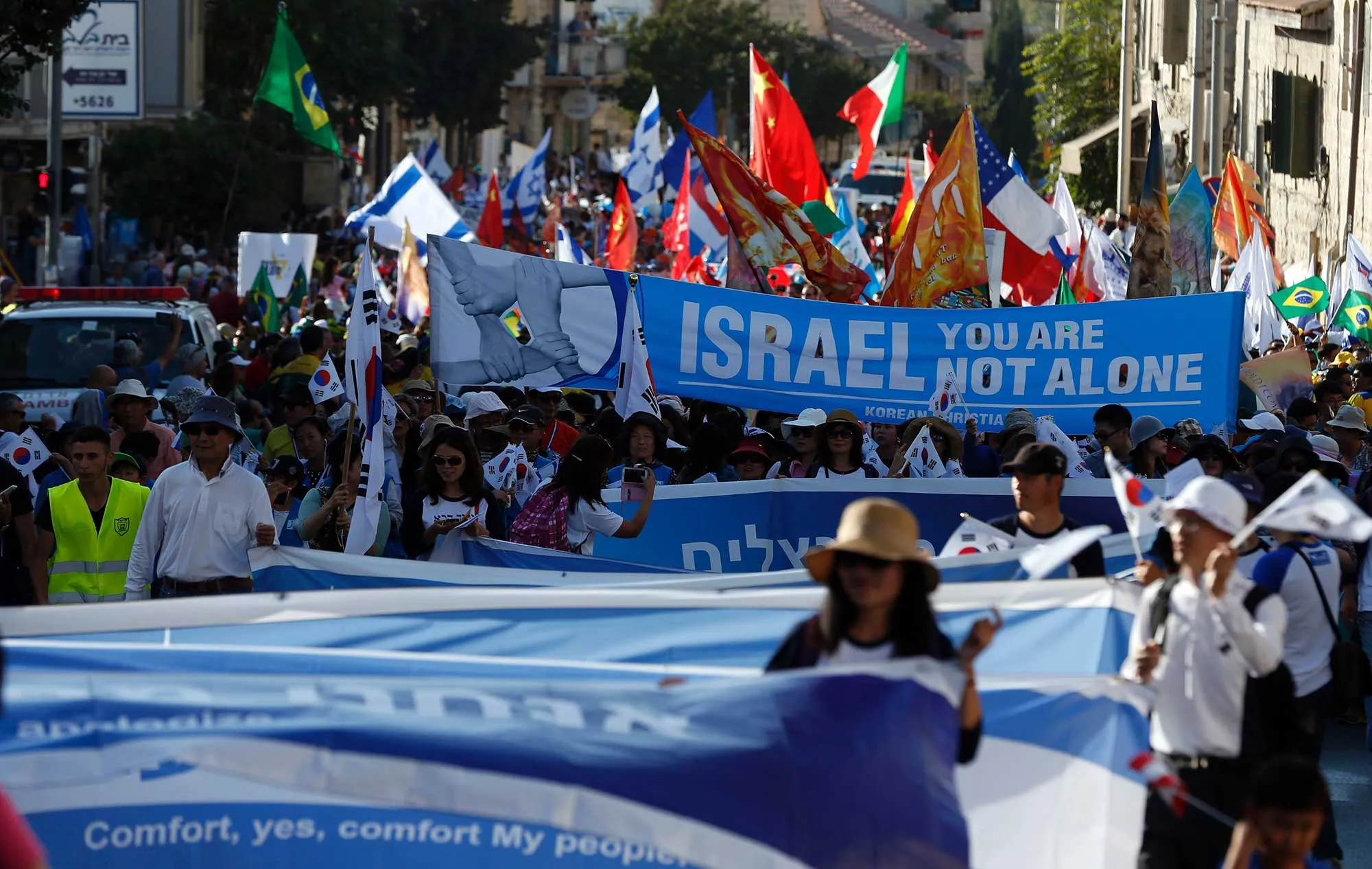 Evangelical Christian pilgrims march during the annual Jerusalem Parade on Oct. 20, 2016 in the streets of Jerusalem, to mark the Jewish holiday of Sukkot (Tabernacles) and to express solidarity with Israel.
