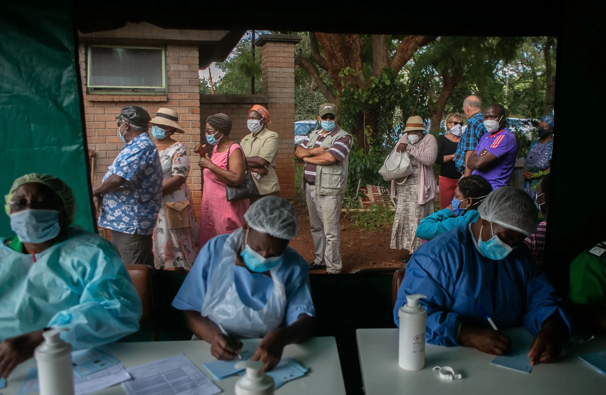 Elderly people queue for the Sinopharm vaccination in Harare, Zimbabwe.&nbsp;