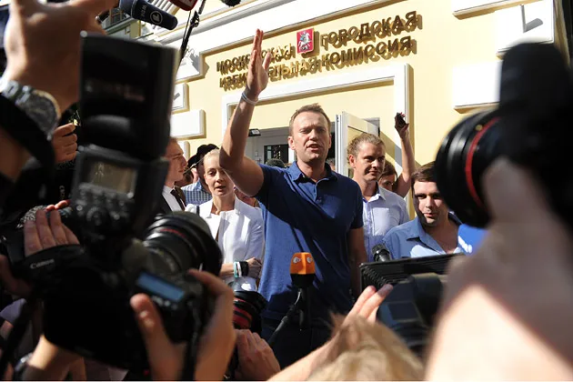 Alexei Navalny addresses journalists and supporters in Moscow after visiting the city’s election commission office on July 10