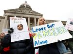 Politicians have discovered the perils of making changes to financially troubled pension plans. Kentucky teachers protested against a 2018 reform bill.