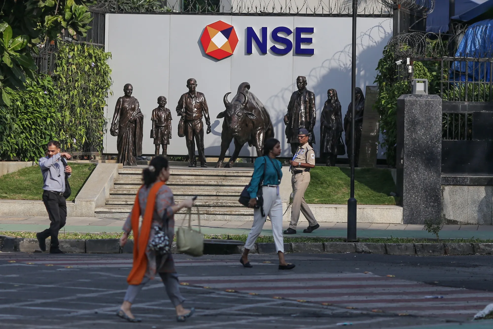 Statues outside the National Stock Exchange in Mumbai, India. 