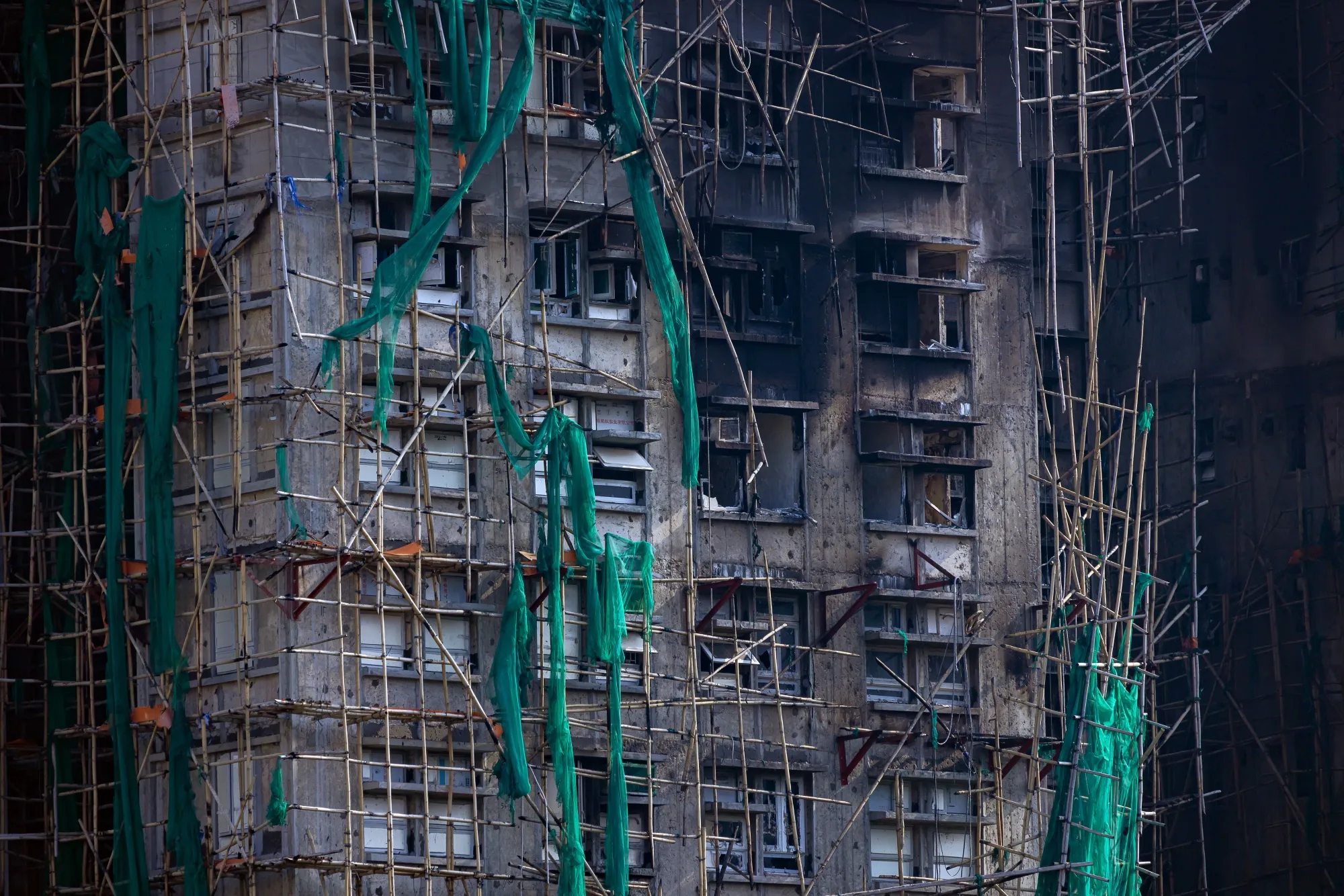 Scaffolding nets and other materials following the fire at Wang Fuk Court in Hong Kong.