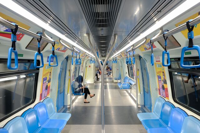 A passenger sits in an empty MRT train carriage in Kuala Lumpur, Malaysia.
