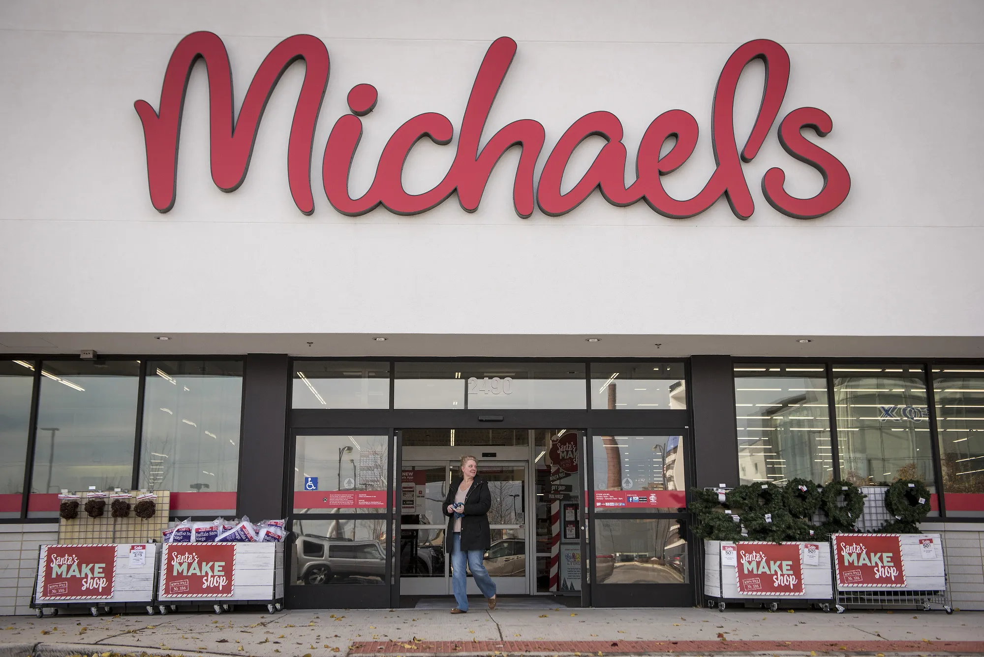 A customer exits a Michaels Cos.&nbsp;store in Chicago.