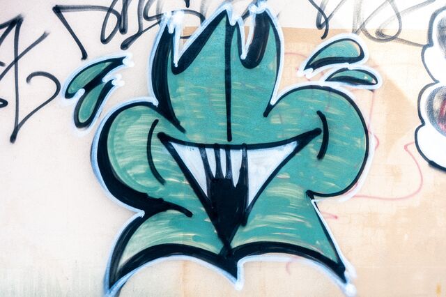 "It is shedding the virus" tag with crown at Pugsley Avenue and Westchester Avenue, Bronx