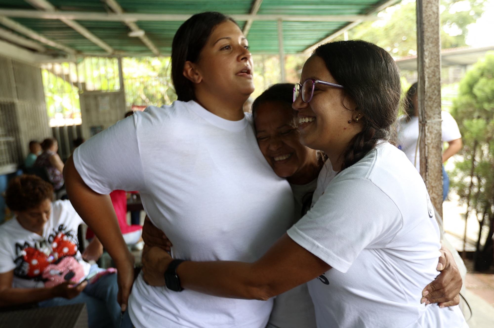 Women hug while waiting for news on the release of prisoners, outside El Rodeo prison in Guatire, Miranda State, Venezuela on Jan. 10.