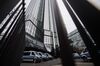 Police vans sit outside the headquarters of Deutsche Bank on Nov. 29.