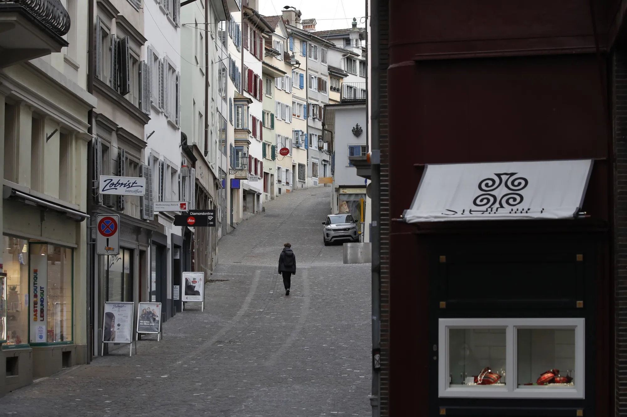 A pedestrian walks&nbsp;in Zurich on Feb. 4.
