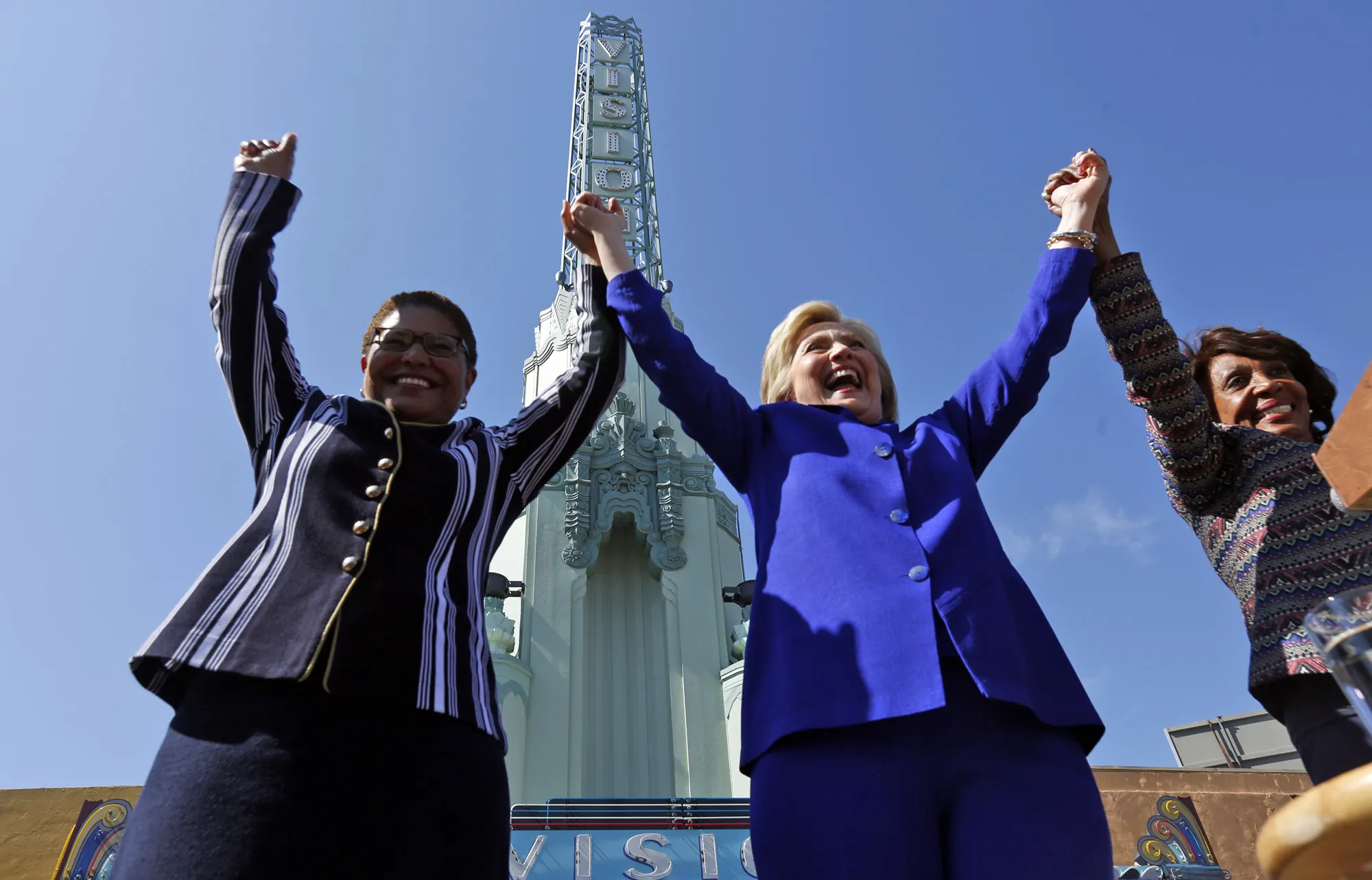 Hillary Clinton&nbsp;joins hands with Karen Bass during a&nbsp;rally in&nbsp;2016 in Los Angeles.