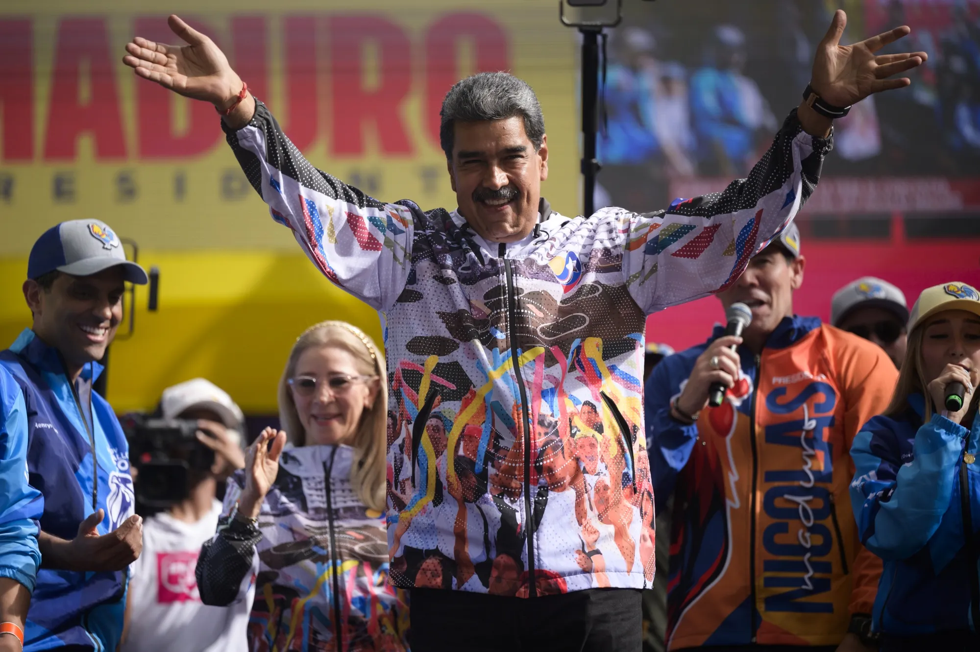 Nicolas Maduro greets his supporters during a campaign rally in Caracas on July 16.