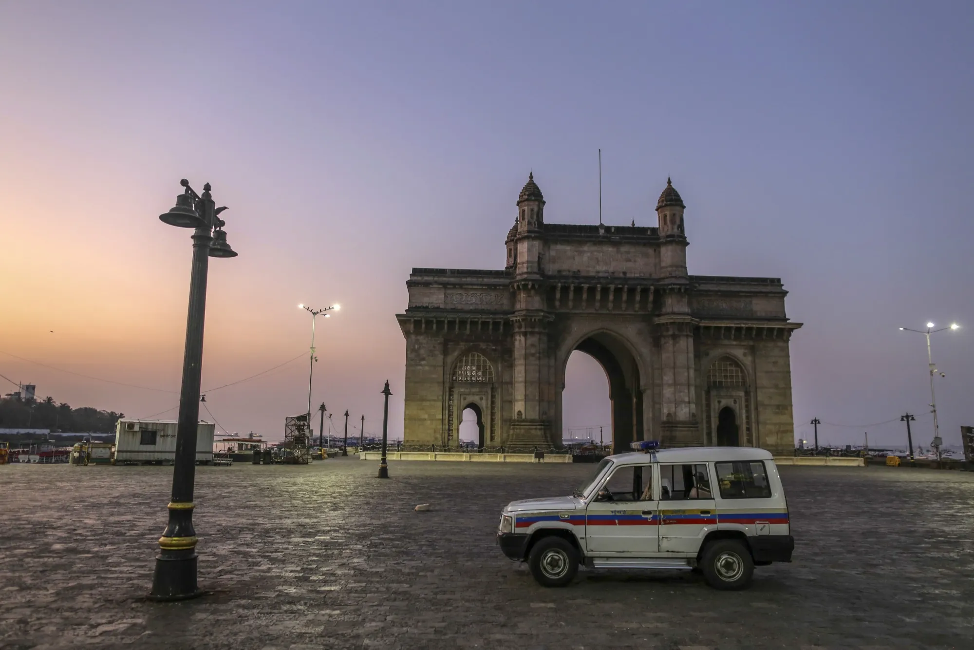 A police vehicle sits at the deserted Gateway of India in Mumbai during the lockdown, on April 5.