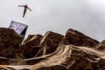 Hassan Mouti of France dives from the 26-meter platform during the 2013 Red Bull Cliff Diving World Series in Cattai, New South Wales, Australia