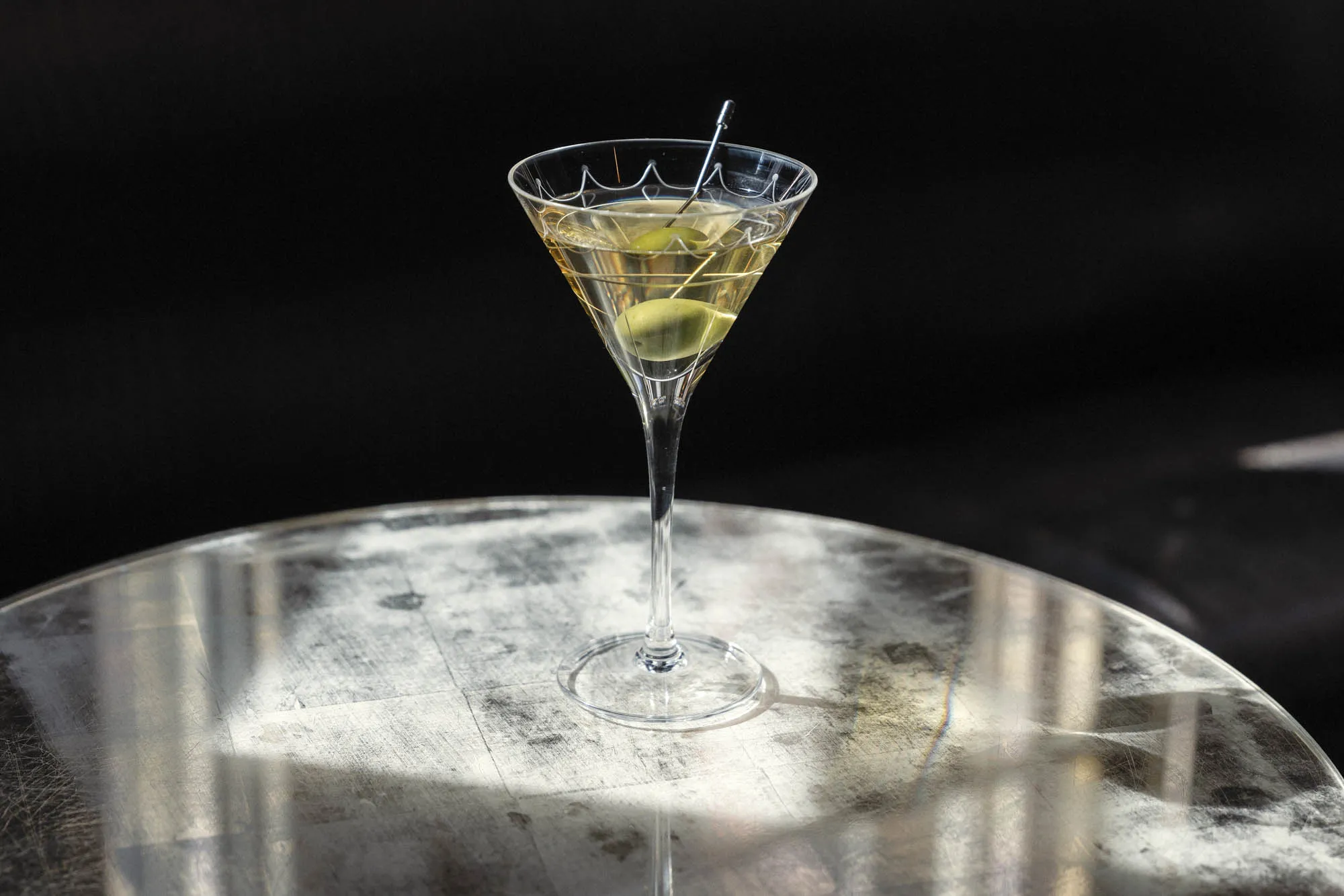 Martini with olive at the Connaught Hotel in London.