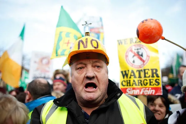 Water tax protesters congregate close to government buildings in Dublin city centre, Ireland, on Wednesday, Dec. 10, 2014.