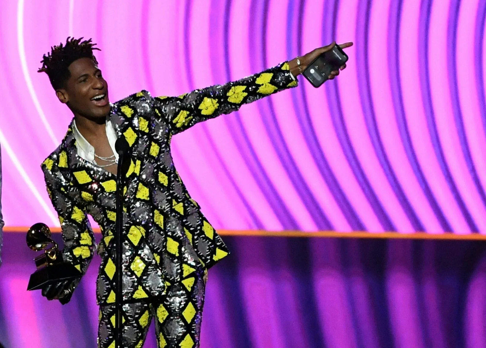Jon Batiste accepts the trophy for Best Music Video during the 64th Annual Grammy Awards on April 3.