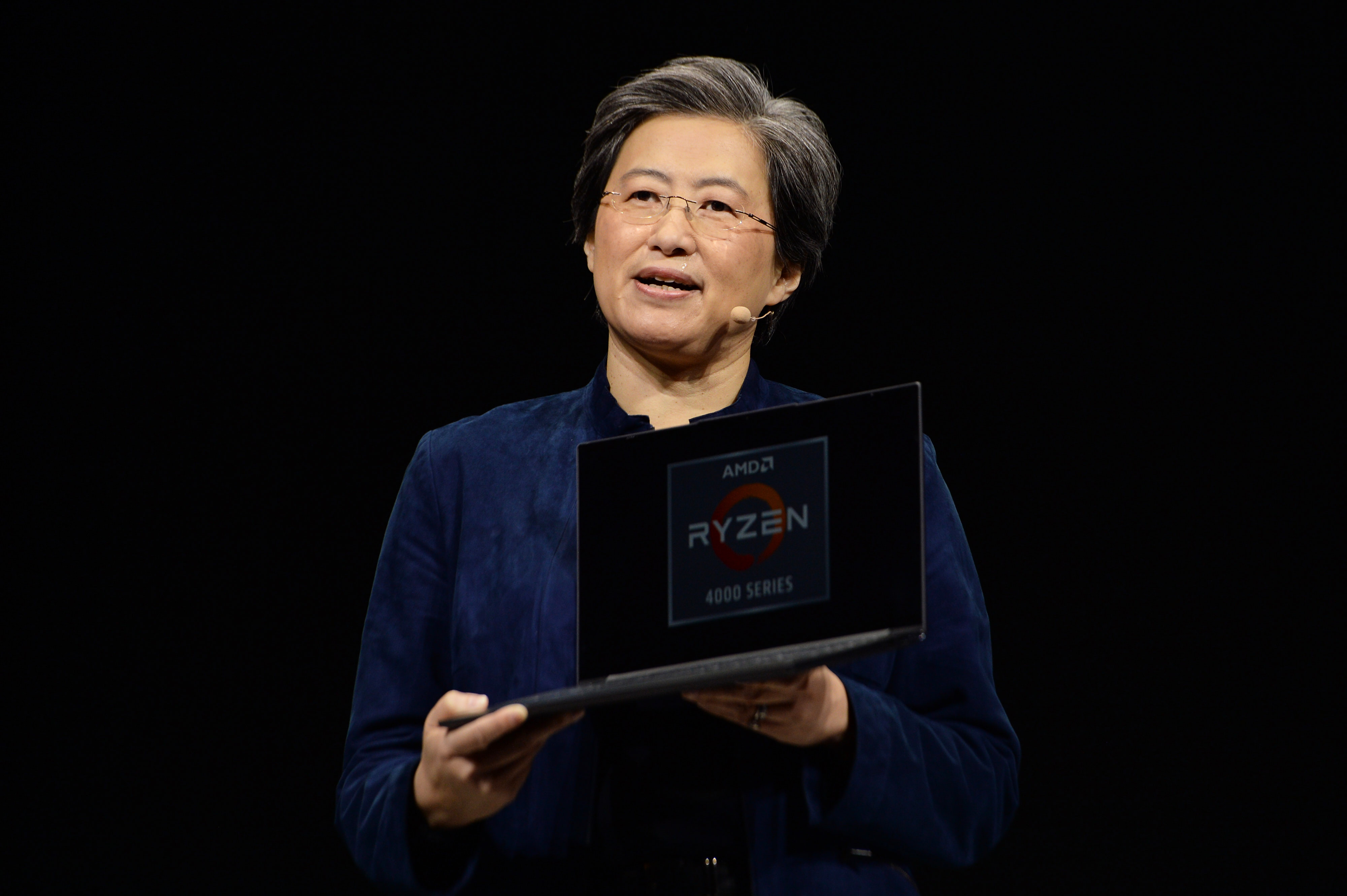 AMD Unveils New Laptop Chips Aimed at Bulk of PC Market Bloomberg