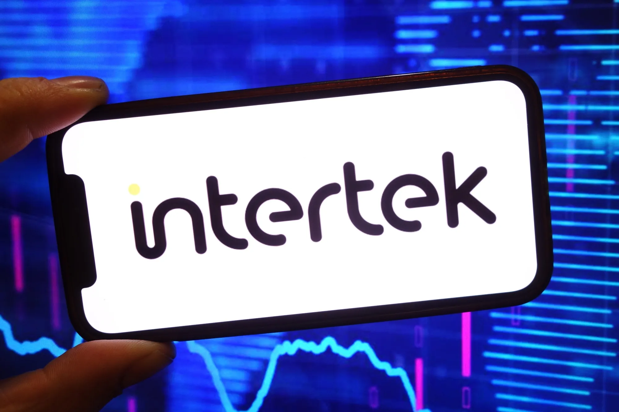In this photo illustration, the Intertek company logo is